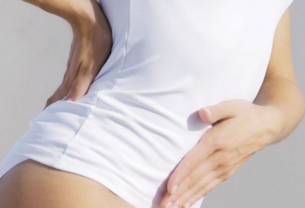 Чому виникають болі в спині при менструації