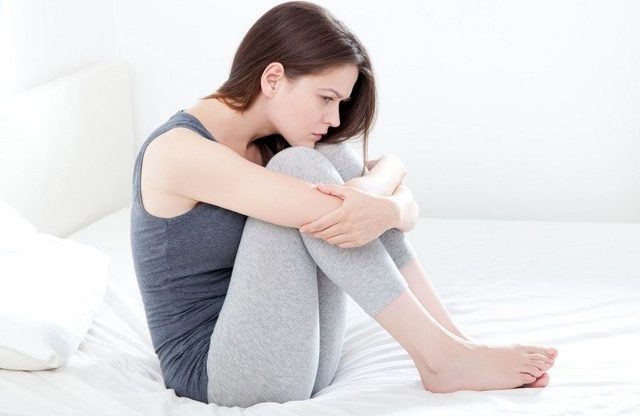 Чому виникають болі в спині при менструації